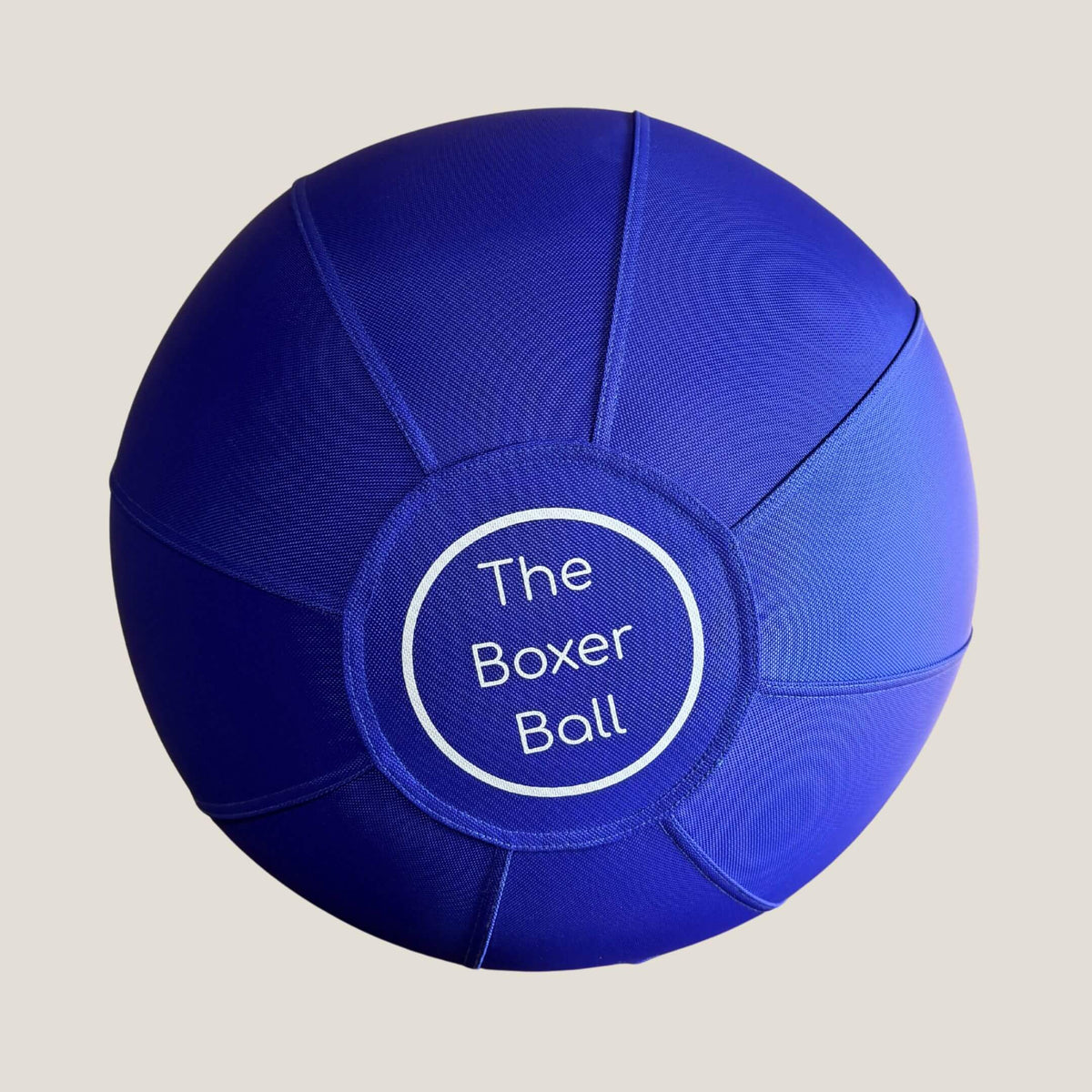 The Boxer Ball – back view of the large blue textured dog toy ball with Bouncing Boxer Co logo